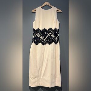 Elegant Cream Dress with Black Lace Detail